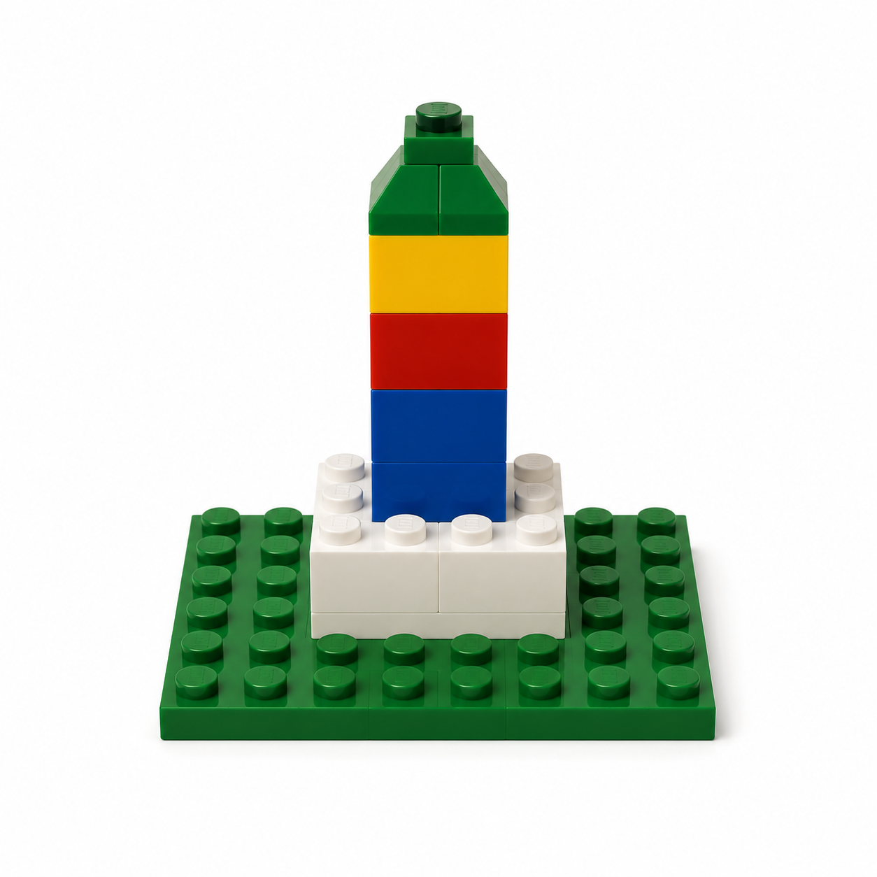 Tall LEGO landmark tower with a green pointed top on a green baseplate
