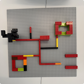 Top-down view of a second path-based LEGO layout with connected brick routes
